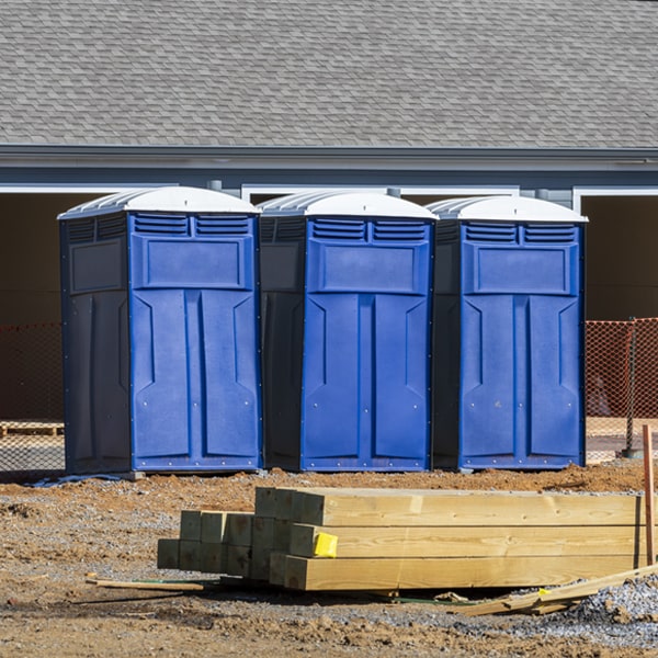 what is the cost difference between standard and deluxe porta potty rentals in Albert OK